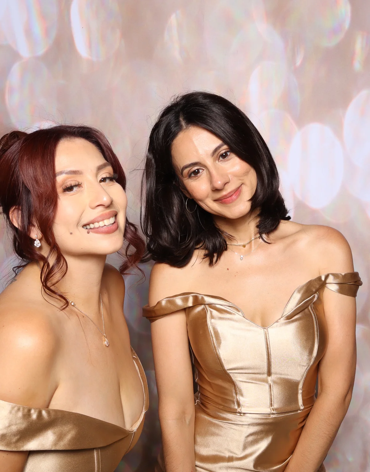 Two guests posing together at a Los Angeles celebration